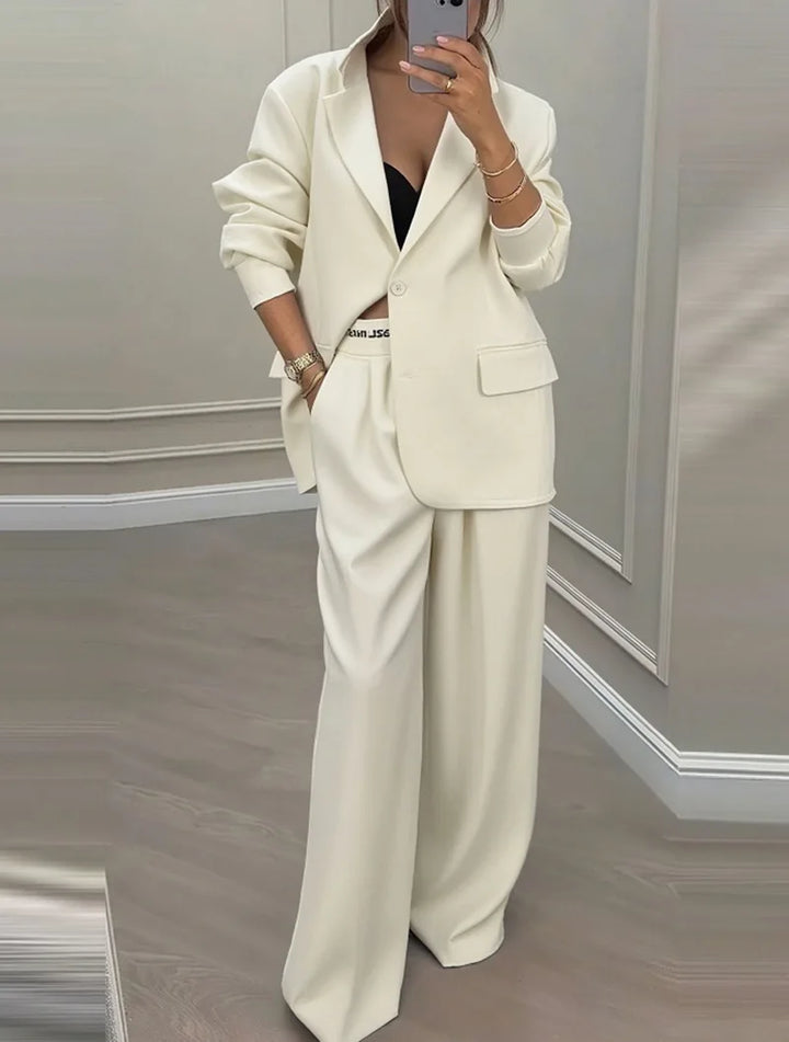 Apricot notched lapel blazer and wide leg trouser suit, front view