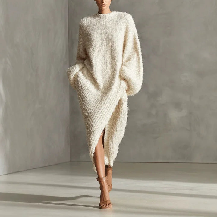 Woman wearing creamy-white bouclé knit maxi dress with high side slit, front view