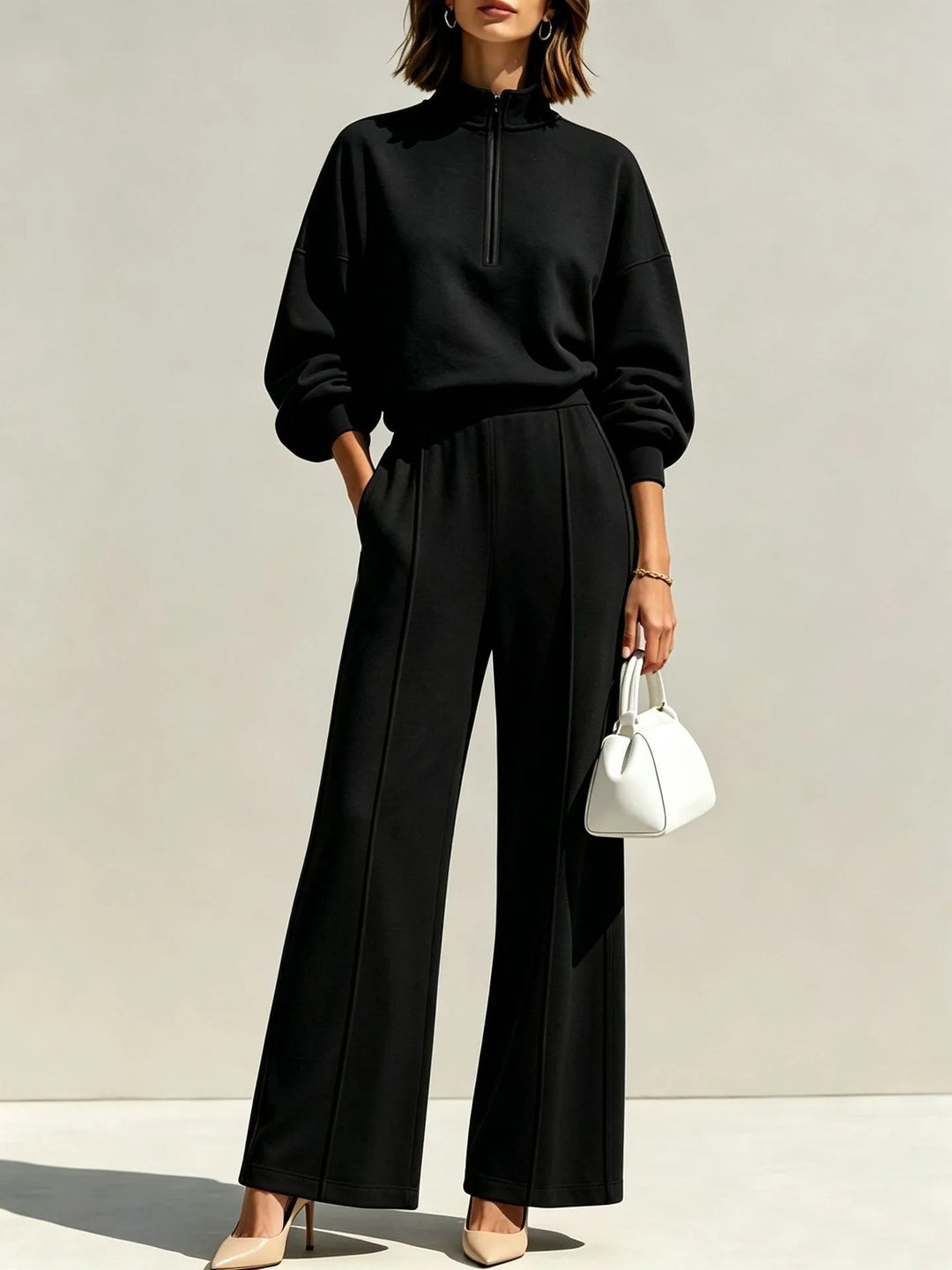 Black quarter zip sweatsuit set with wide leg pants