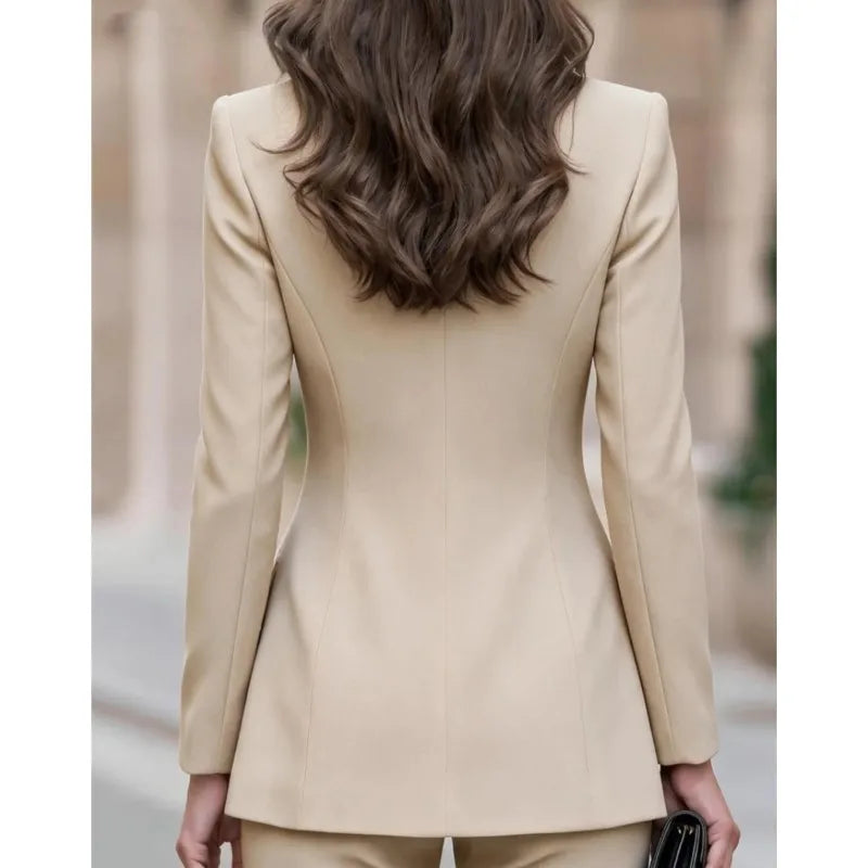 Back view of beige tailored blazer showing fitted seaming