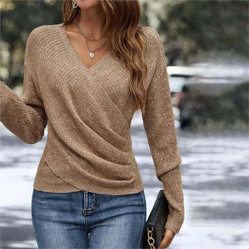 Woman wearing dark khaki ribbed knit wrap-front sweater with V-neck