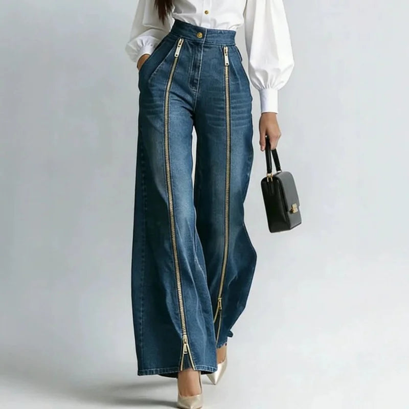 Woman wearing high waist wide leg jeans with gold zipper detail, front view