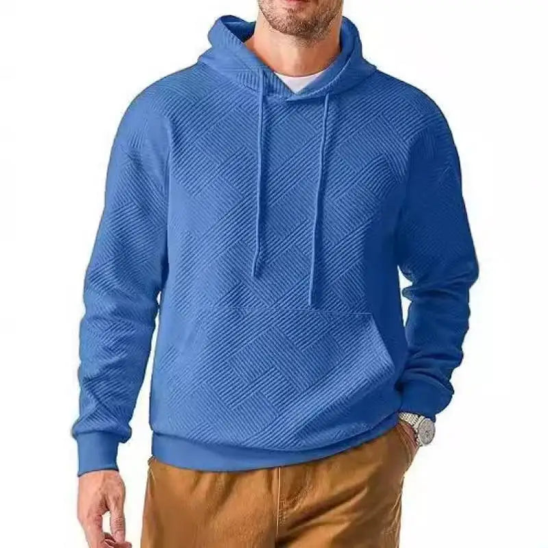 Man wearing blue textured knit pullover hoodie