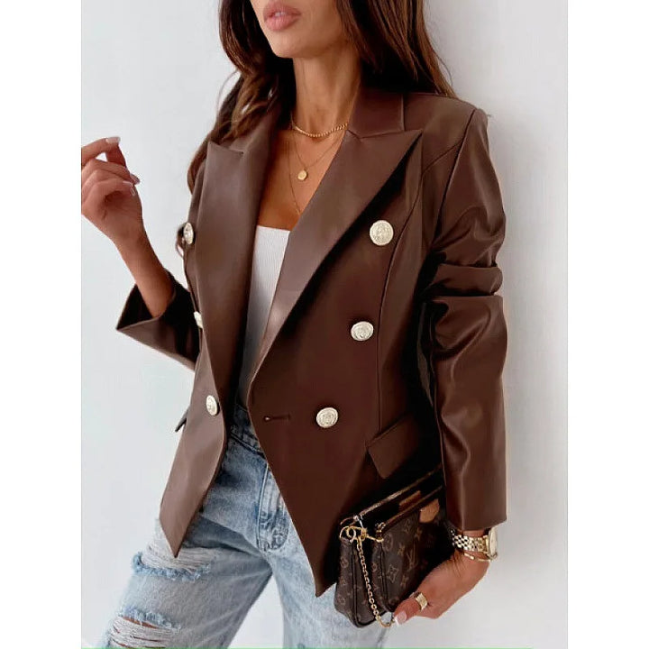 Woman wearing dark brown faux leather double breasted blazer