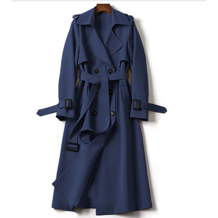 Navy blue belted trench coat on hanger, front view