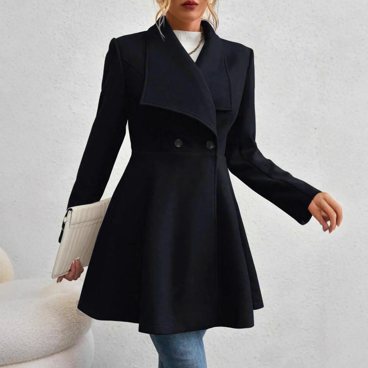 Woman wearing black waterfall collar swing coat, front view with clutch