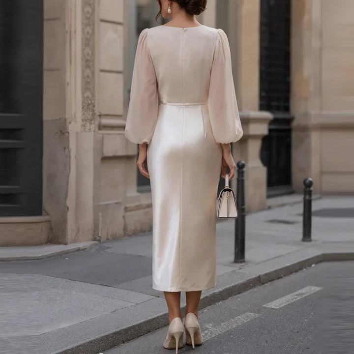Back view of beige satin midi dress with lantern sleeves