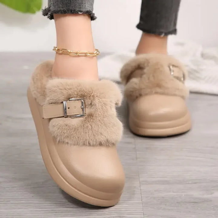 Khaki faux fur platform clog slipper worn on foot, back view
