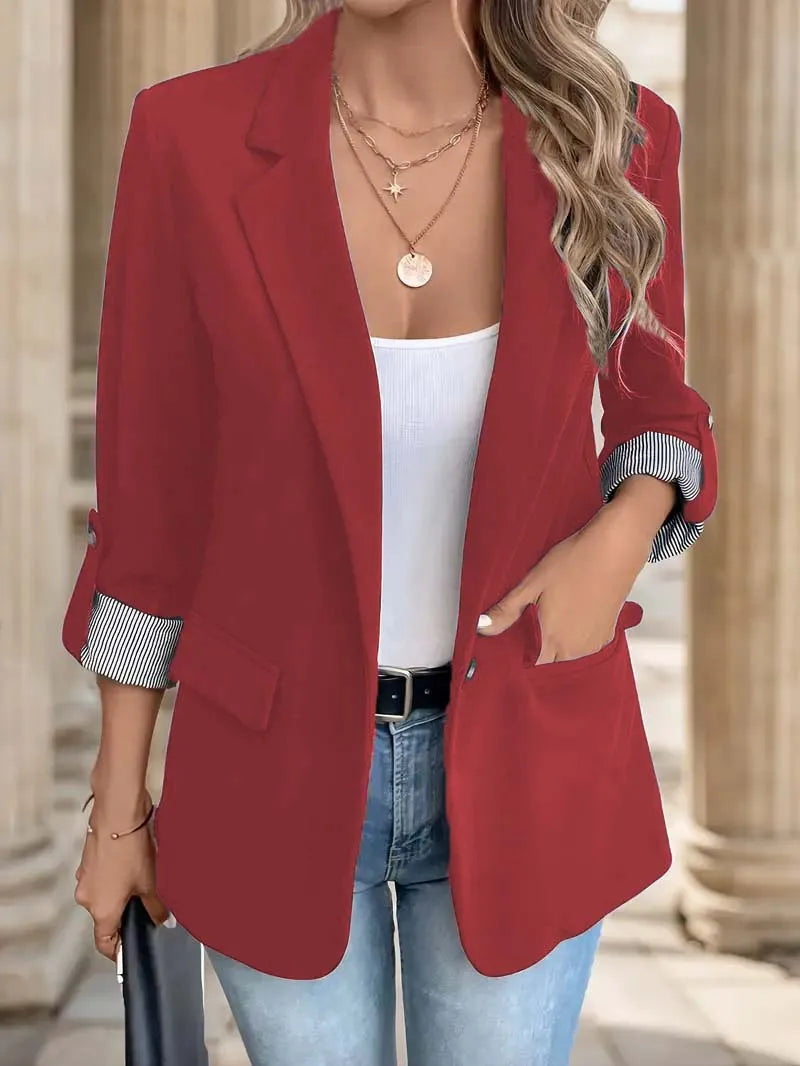 Red blazer front view with rolled sleeve detail