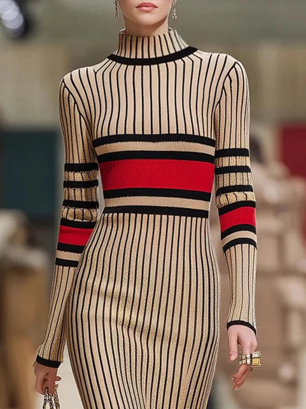 Close up of striped knit dress bodice with high mock neck and contrast stripe waistband