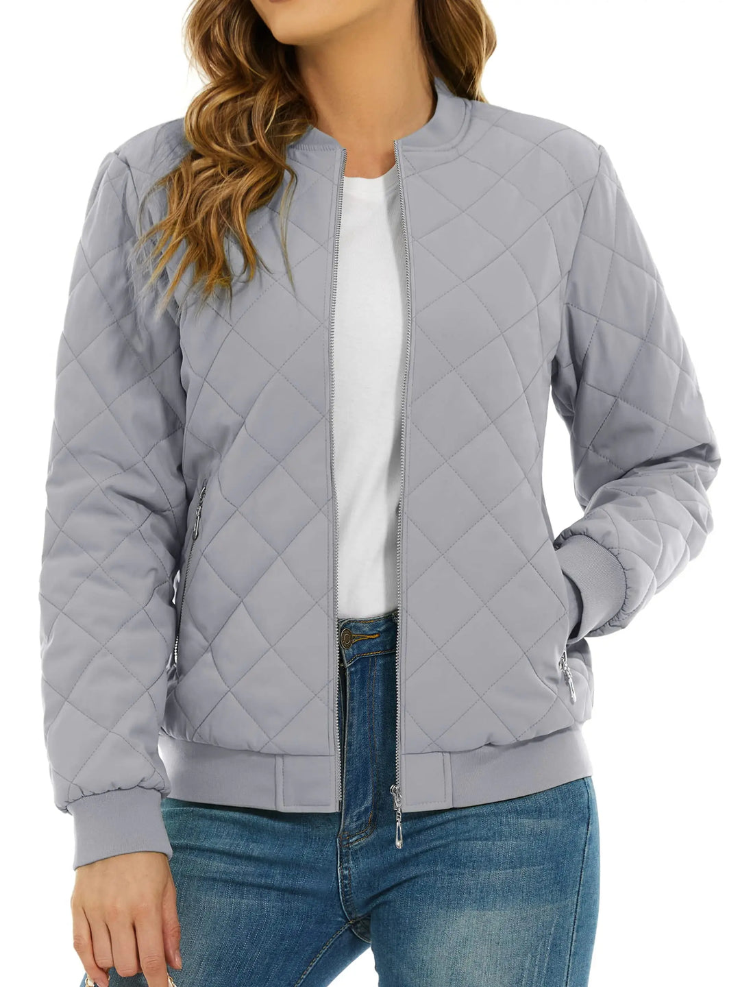 Close up of light gray quilted bomber jacket with zip pocket