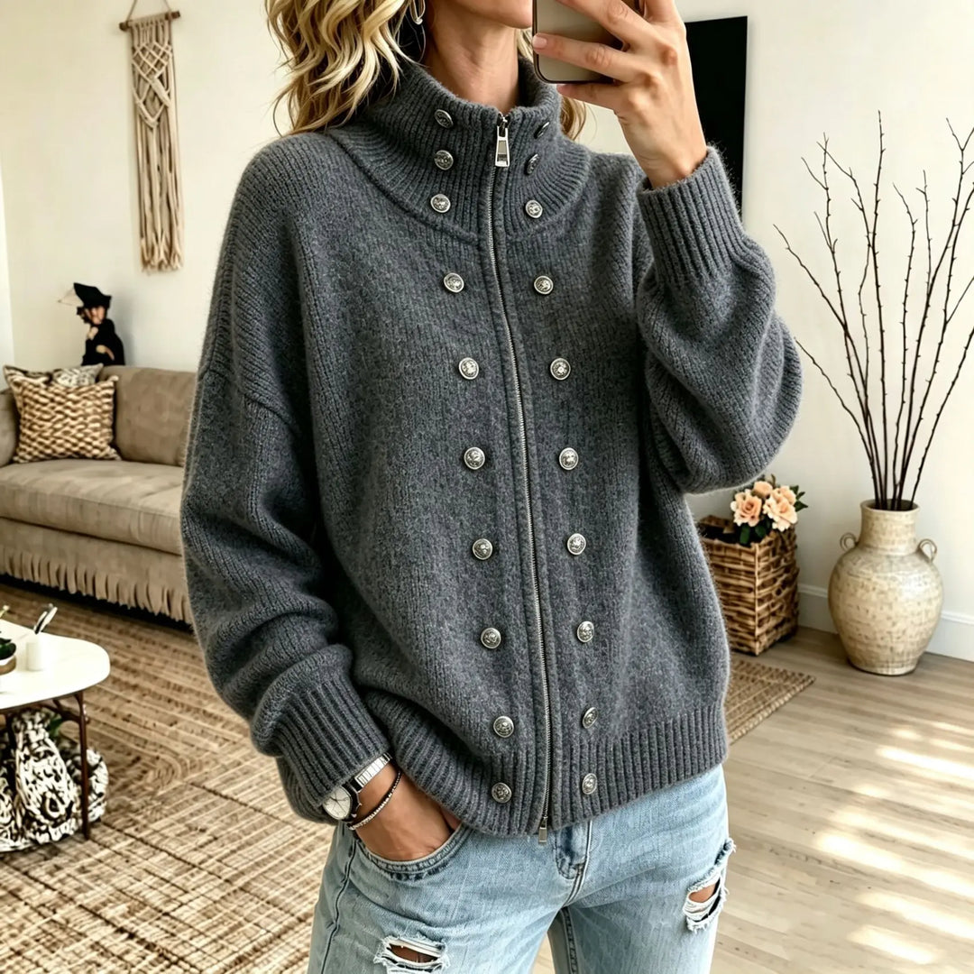 Woman wearing dark grey stand collar zip cardigan with button details