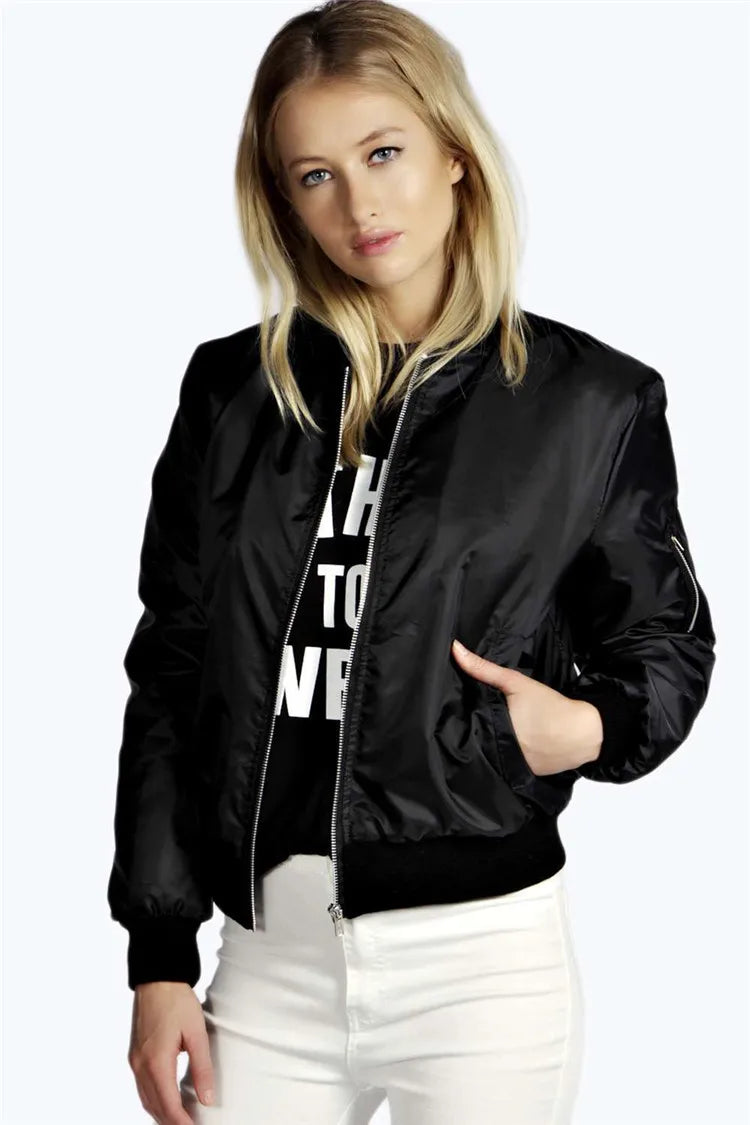 Woman wearing black bomber jacket, front view