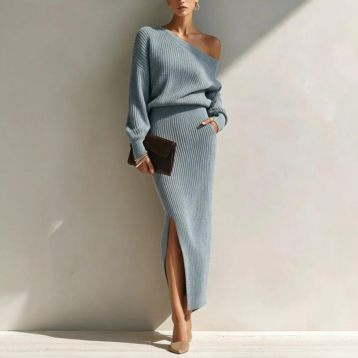 Woman wearing blue off shoulder ribbed knit sweater and skirt set
