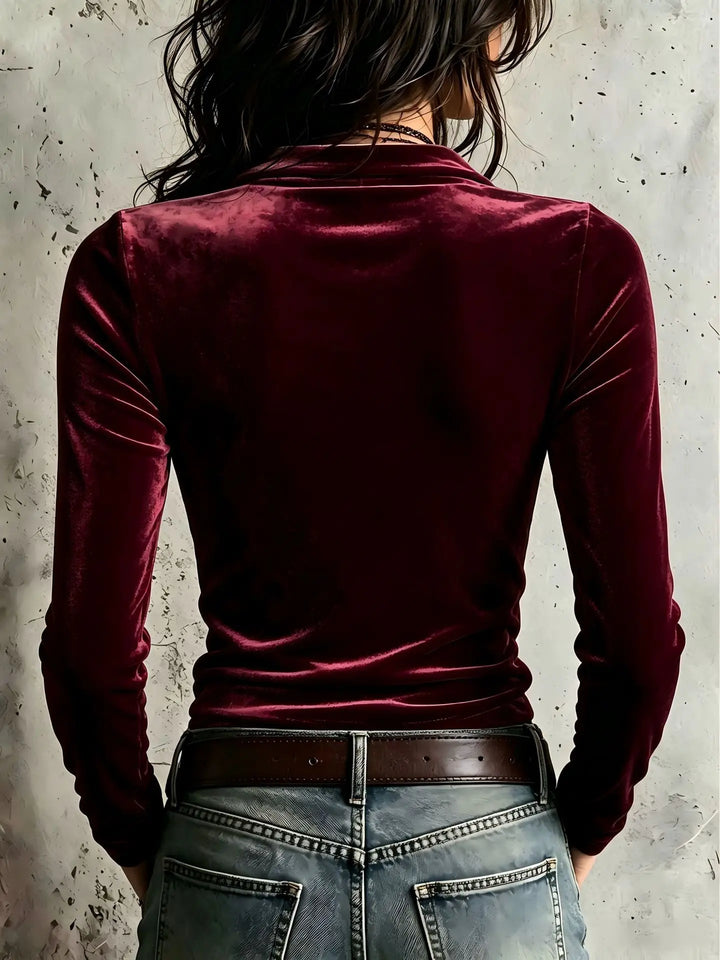Back view of wine red velvet half zip top