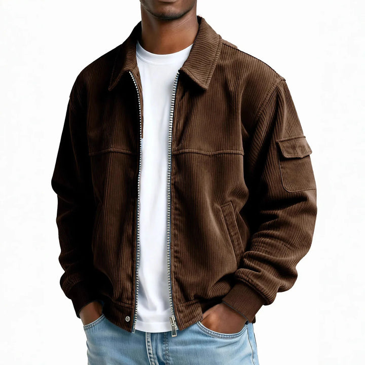 Man wearing dark brown corduroy zip jacket with flap pocket