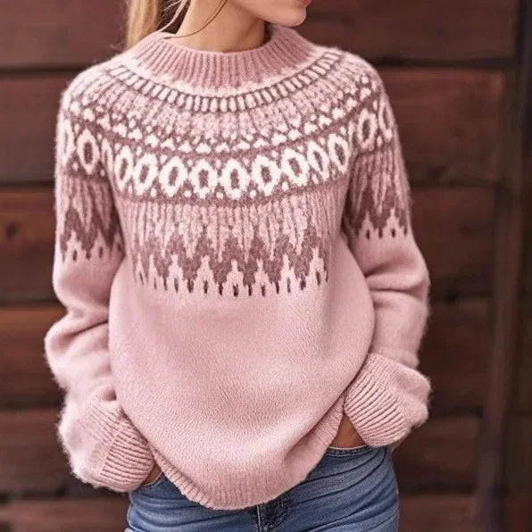 Close up of pink fair isle knit sweater pattern