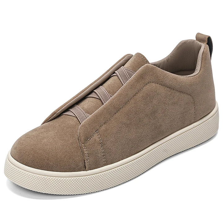 Khaki suede-look sneaker side angle view on white background