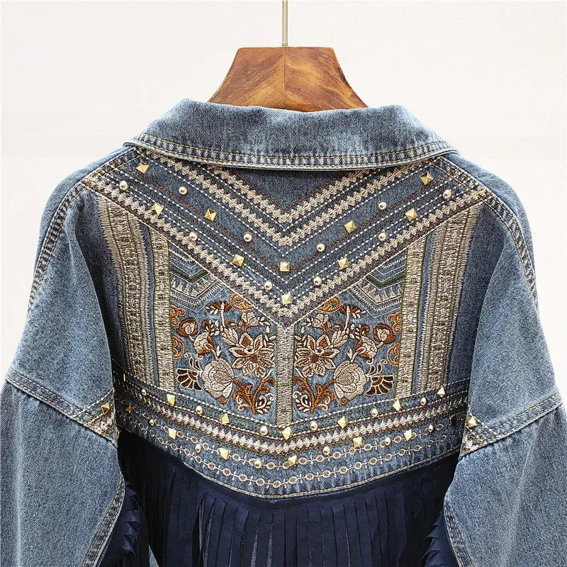 Close up of embroidered studded yoke on denim jacket