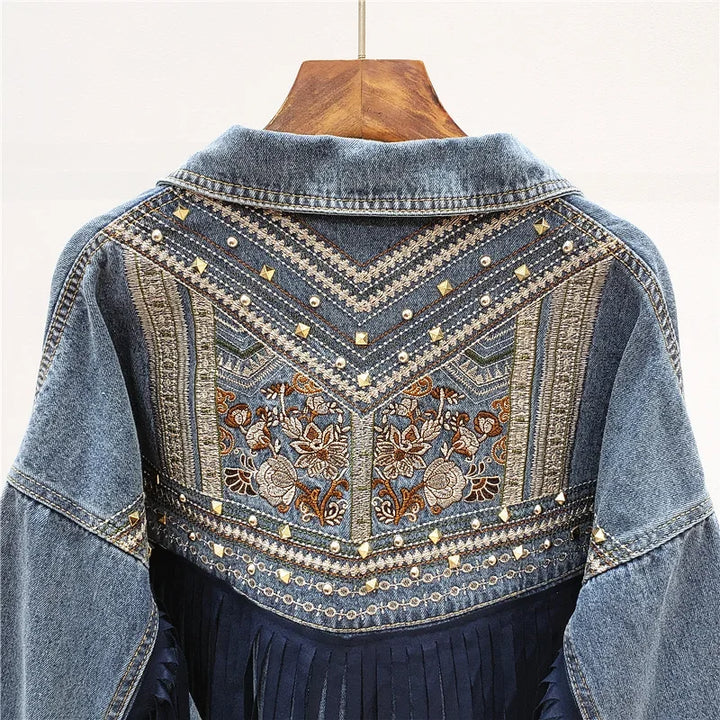 Close up of embroidered studded yoke on denim jacket