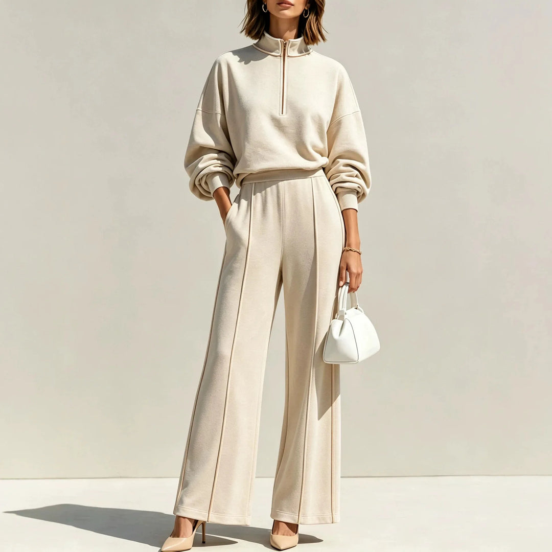 Woman wearing apricot half zip pullover and wide leg pants set, front view