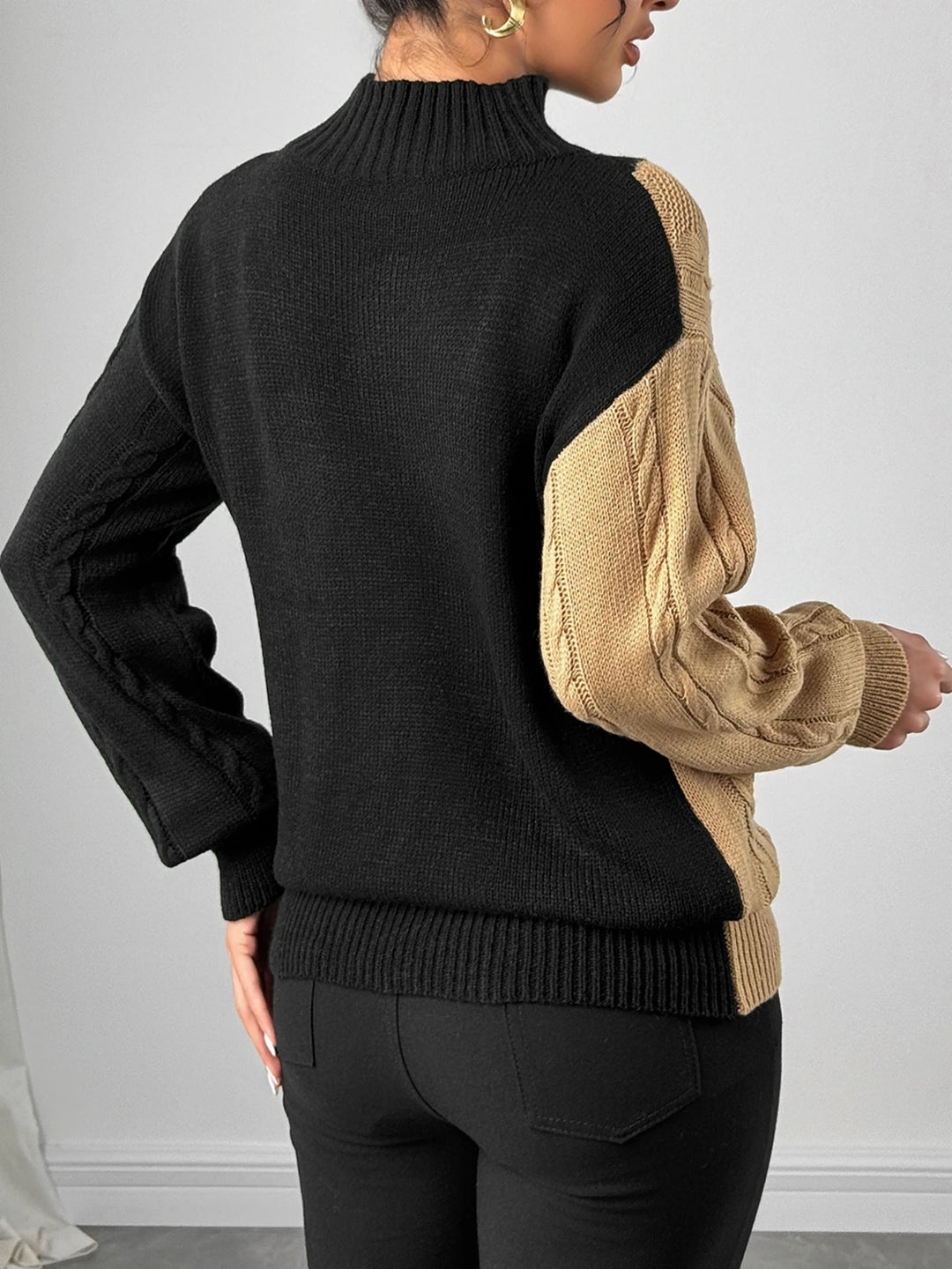 Khaki and black color block cable knit sweater, back view