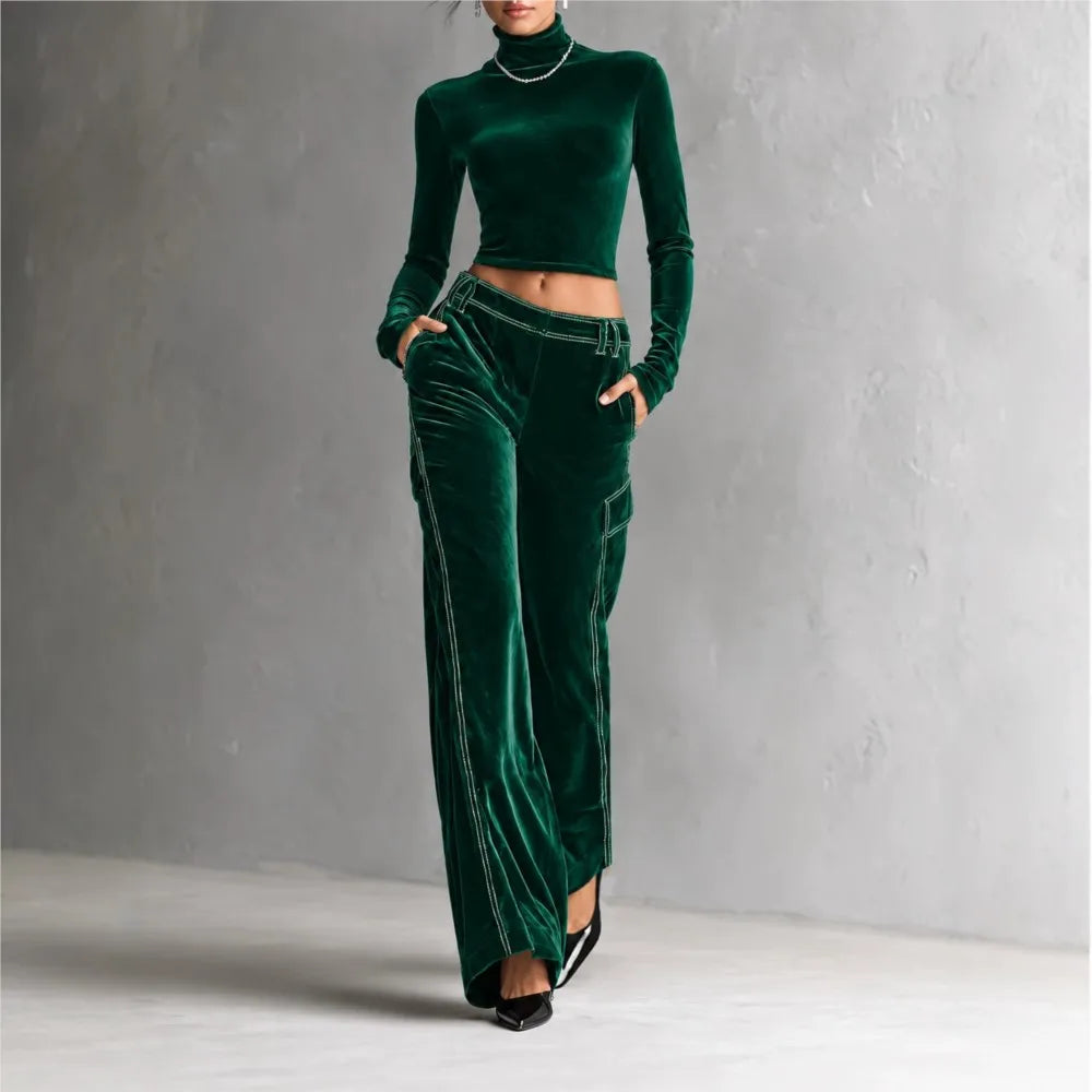 Woman wearing green velvet cropped turtleneck and wide leg cargo pants set