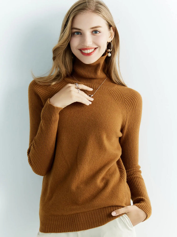 Smiling woman wearing caramel turtleneck sweater