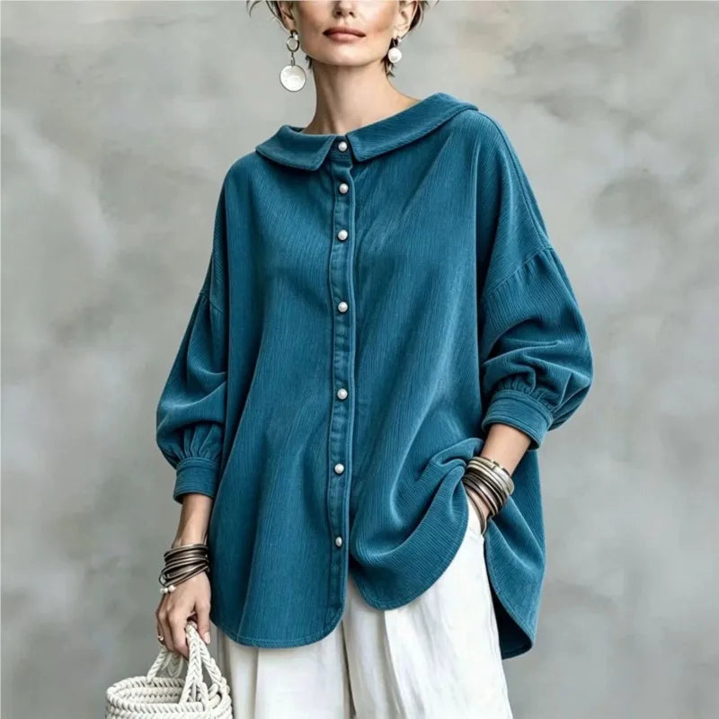 Malachite blue blouse with turn down collar and balloon sleeves, front view