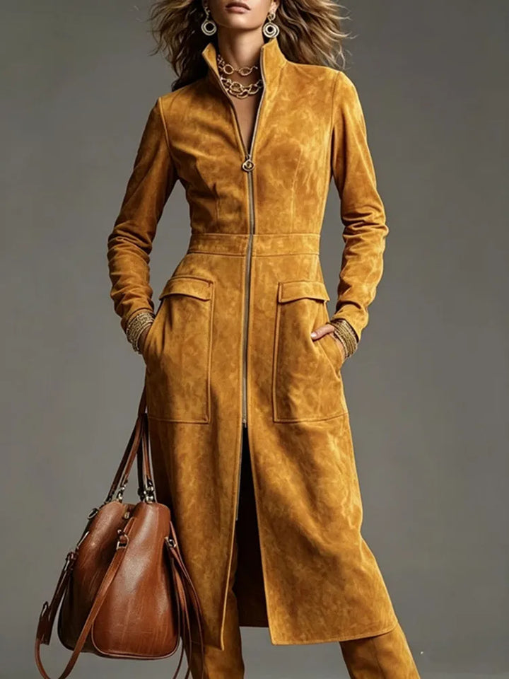 Woman wearing yellow suede-look stand collar zip dress with patch pockets