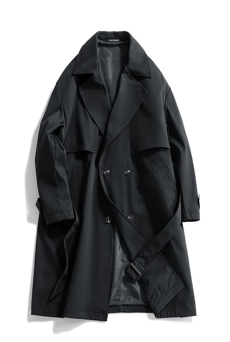 Black double breasted trench coat laid flat open front