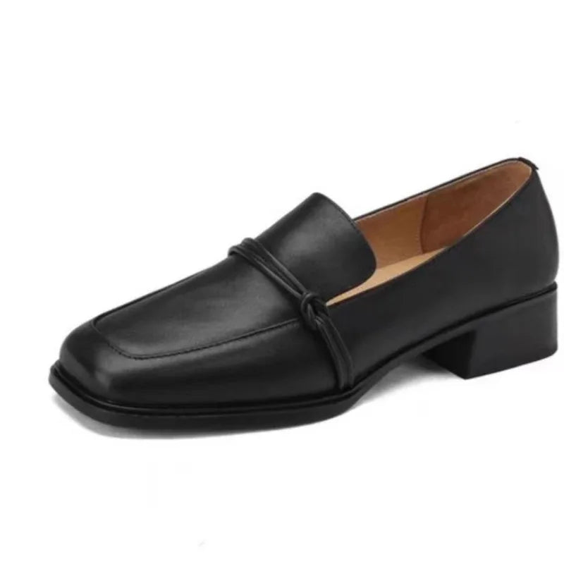 Black leather loafer with knotted strap detail