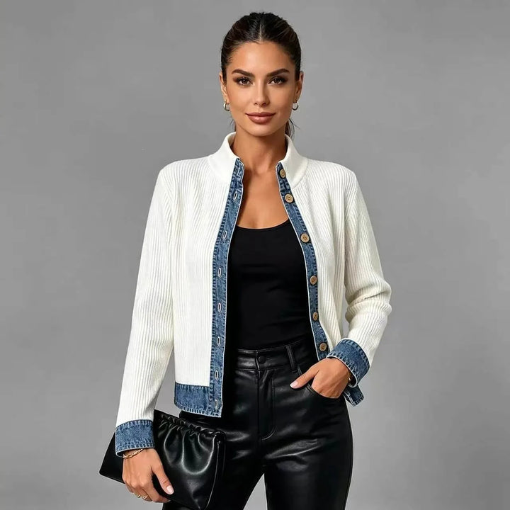 Woman wearing white cardigan with denim collar and cuffs