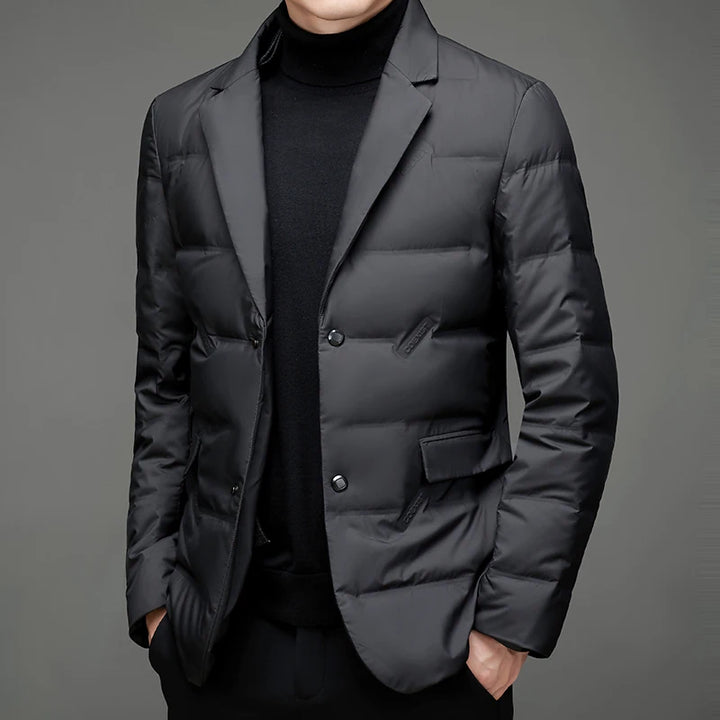 Black quilted down blazer jacket front view with hands in pockets