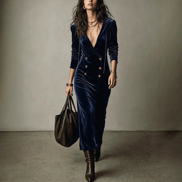 Woman wearing navy blue hooded velvet wrap midi dress