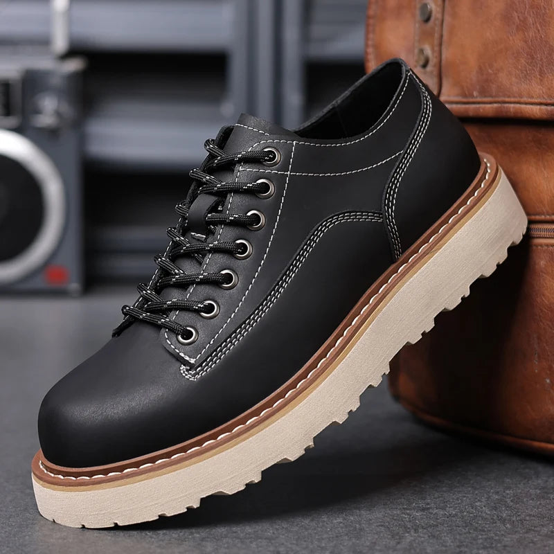 Black leather oxford shoe side profile with contrast stitching