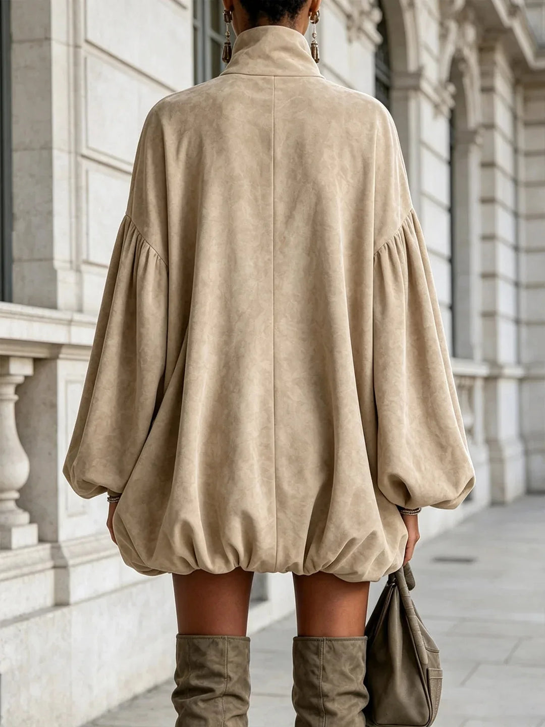 Back view of khaki turtleneck mini dress with lantern sleeves