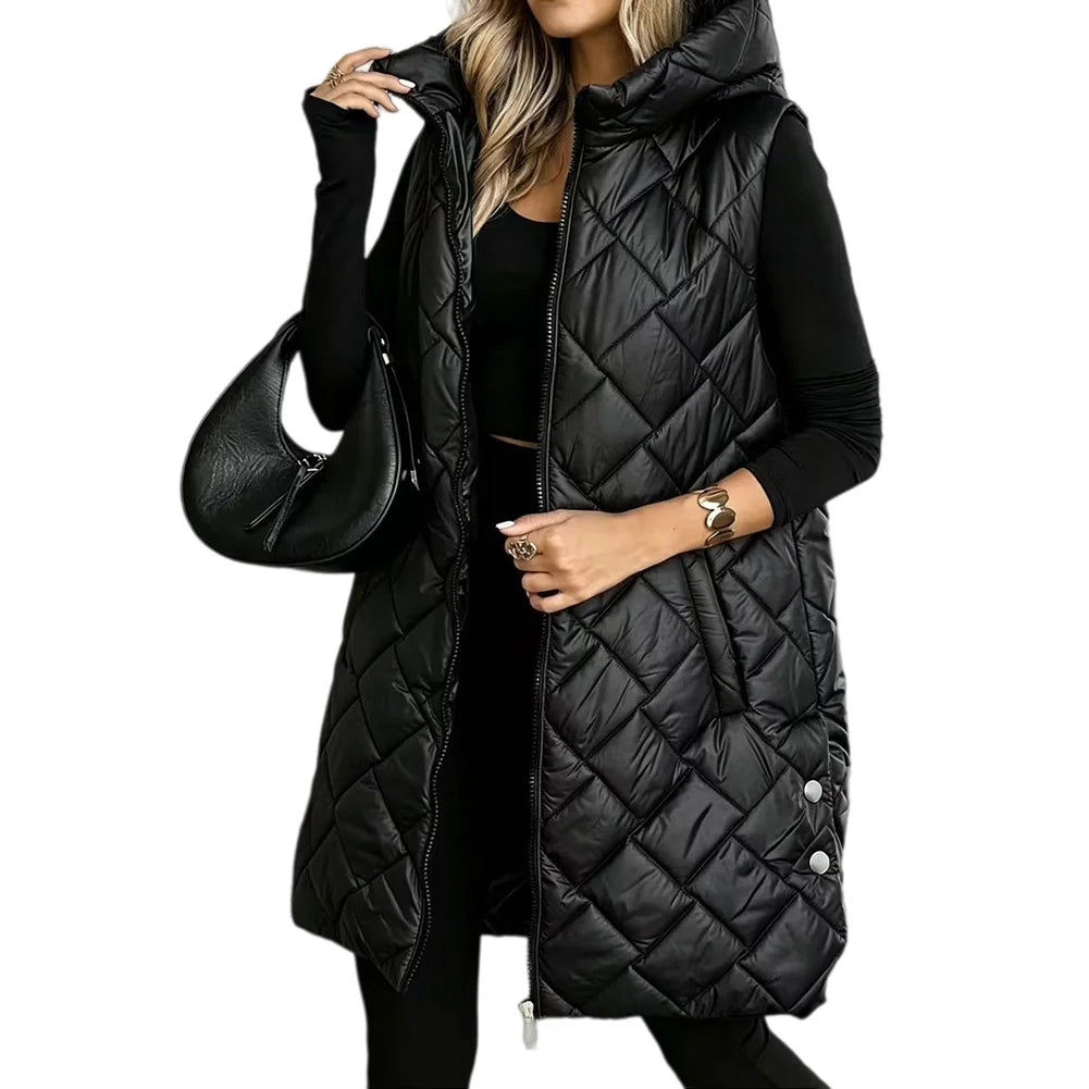 Woman wearing black long quilted puffer vest with hood and side snaps