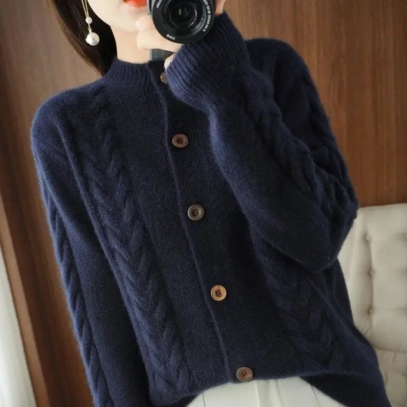 Navy cable knit cardigan with stand collar and buttons