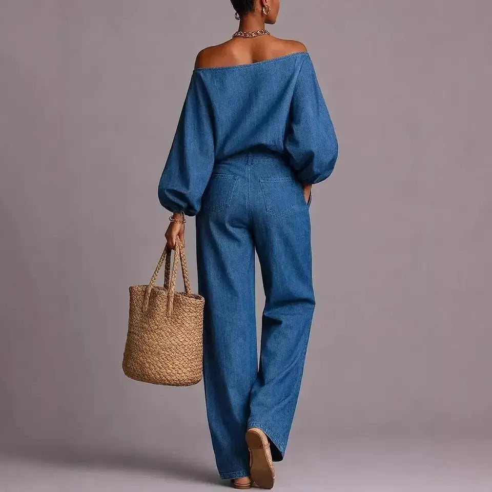 Woman wearing blue denim-look two piece off shoulder top and wide leg pants set, back view