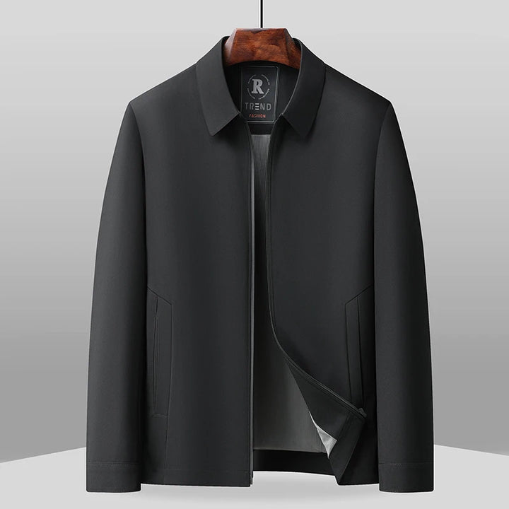 Black zip-front jacket on hanger, front view