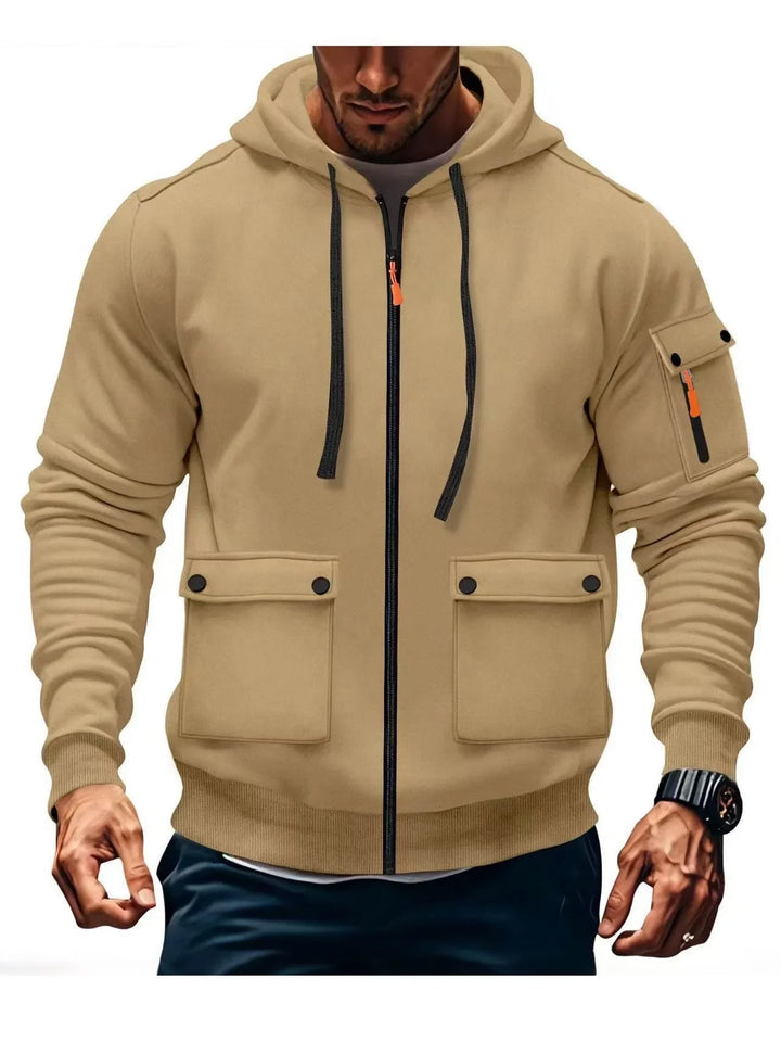 Man wearing khaki zip-up cargo hoodie with chest pockets