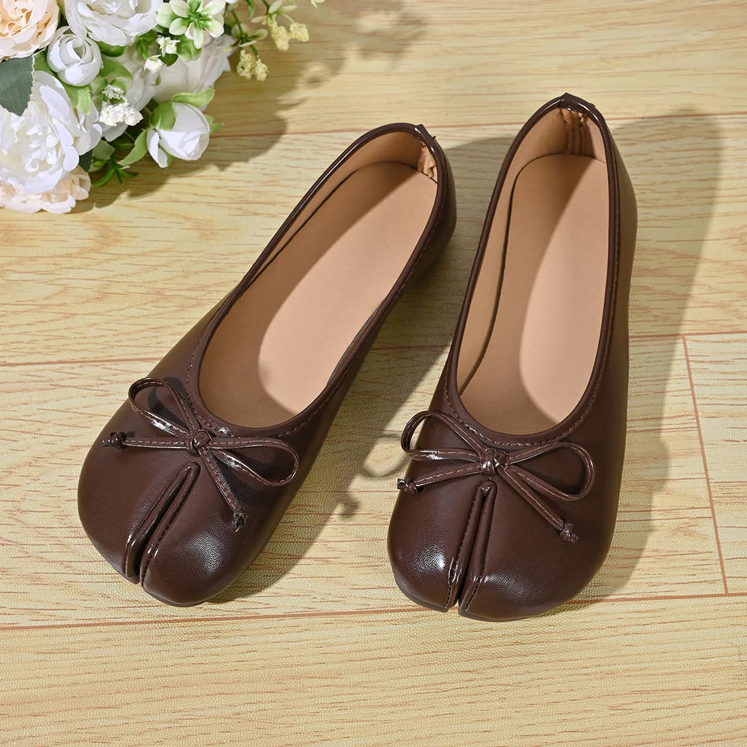 Brown faux leather ballet flats angled view