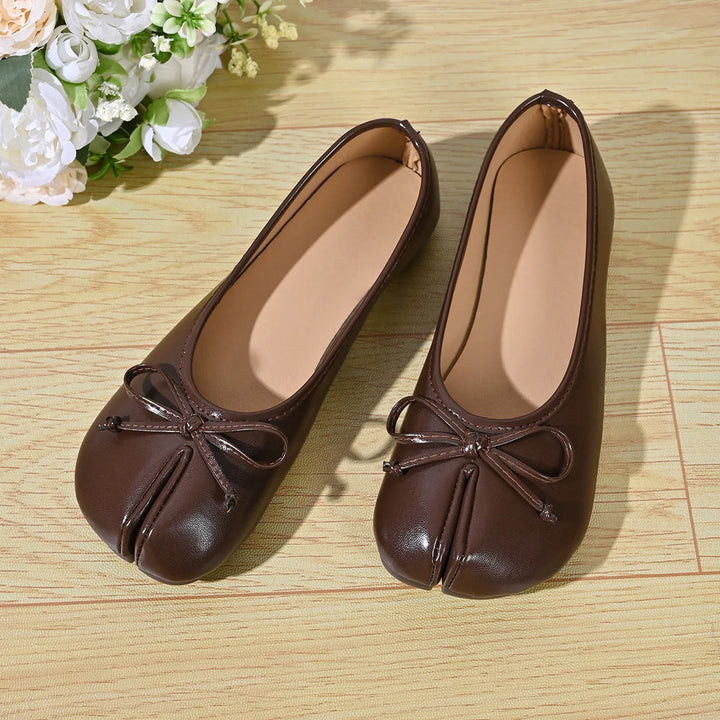 Brown faux leather ballet flats angled view