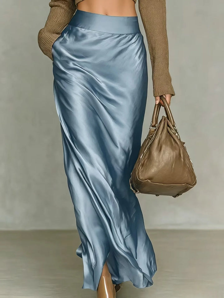 Light blue satin maxi skirt with side slit, back view