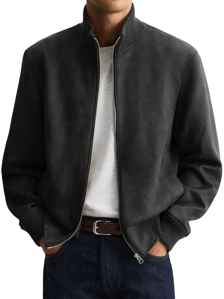 Man wearing black suede-look bomber jacket with ribbed cuffs