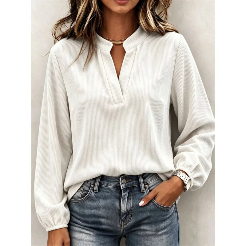 White ribbed corduroy blouse with V-neck, front view