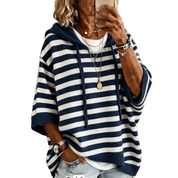 Navy blue and white striped hooded sweater close up