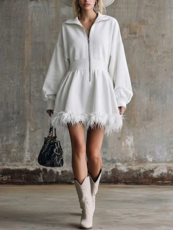 White half-zip sweatshirt mini dress with feather trim hem, front view