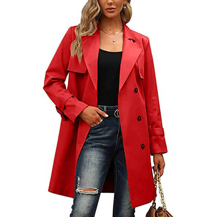 Woman wearing red double-breasted trench coat, front view